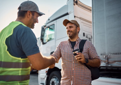 Happy truck driver working for excelleng Trucking Companies in Kansas City MO