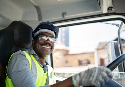 A happy driver in the middle of Truck Driver Jobs in Kansas City MO