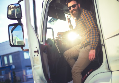 A happy driver enjoying his Trucking Jobs in Wisconsin