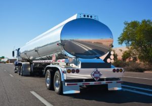A tanker trailer being hauled, part of bulk transport in the Midwest. Stoller Trucking provides Food-Grade Tanker Michigan Services.