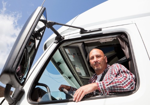 Driver hauling a load of general freight in Stoller Trucking semi