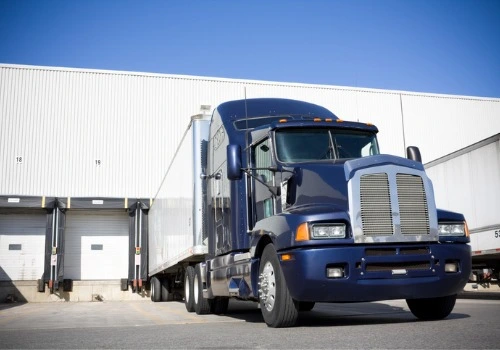 A trucking being loaded for Freight Shipping in Iowa