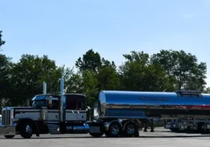 Liquid tanker in transit, representing Stoller Trucking's specialized transport services. Stoller provides Bulk Liquid Transport Illinois services.
