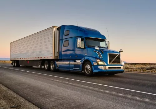 A Stoller Trucking Semi on the highway, in route to it's destination in the Midwest, providing reliable freight and shipping services
